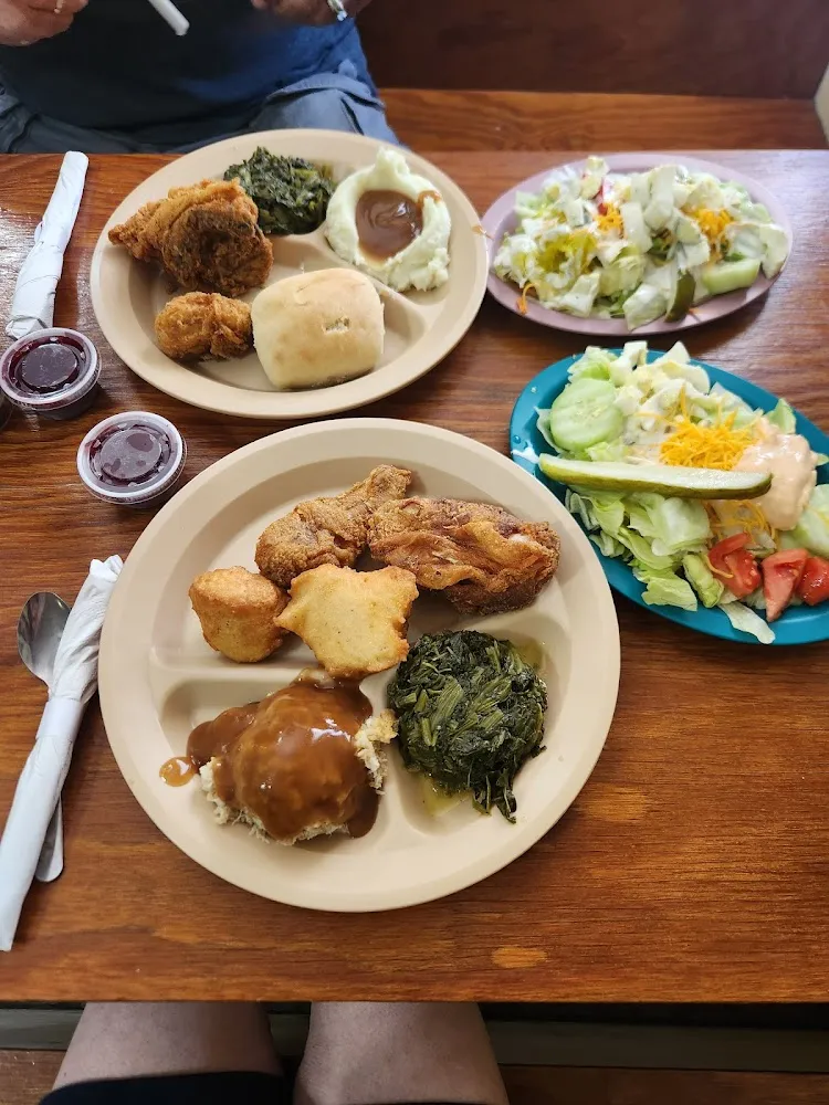 Fried Chicken Mashed Potatoes Turnip Greens Corn Bread and a Salad Bar Salad